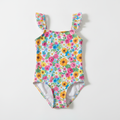 Maillot de bain une pièce fleuri pour petite fille sur fond blanc